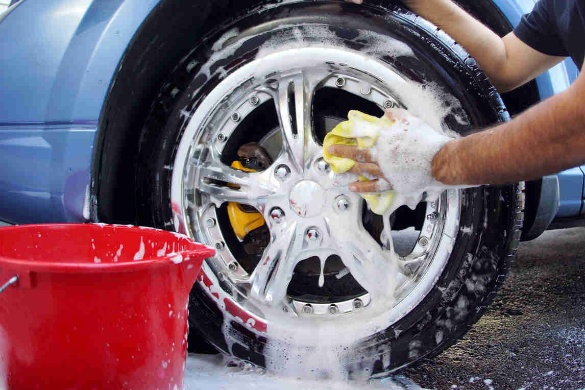 wash your car tires to remove ants