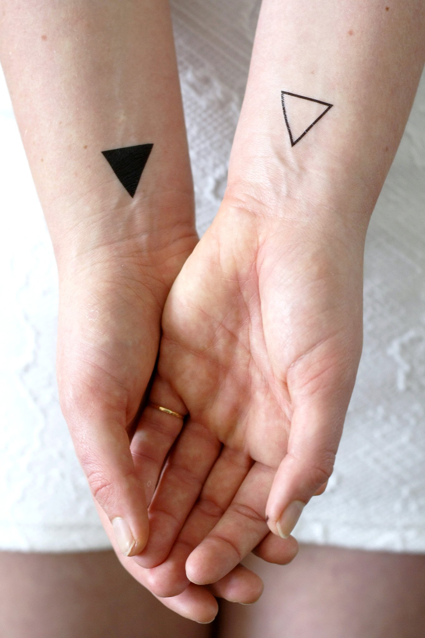 male female significant triangle tattoo