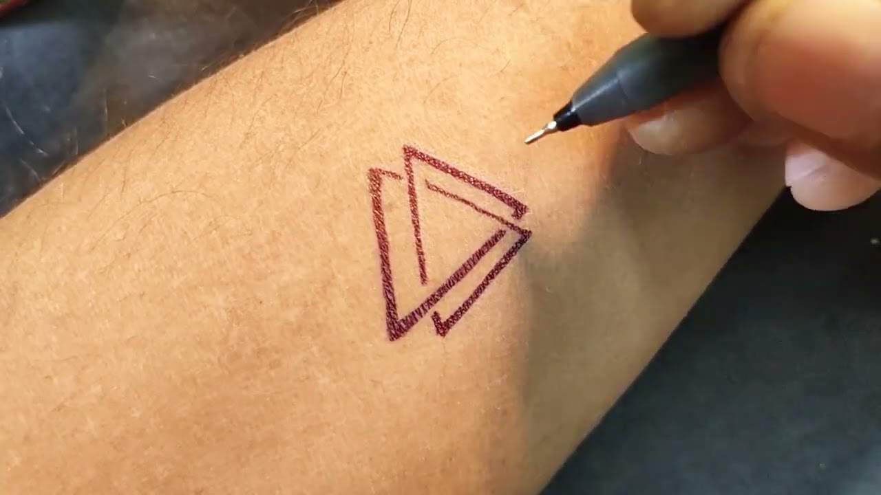 triangle tattoo inking process
